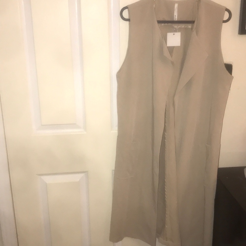 Brand new long vest